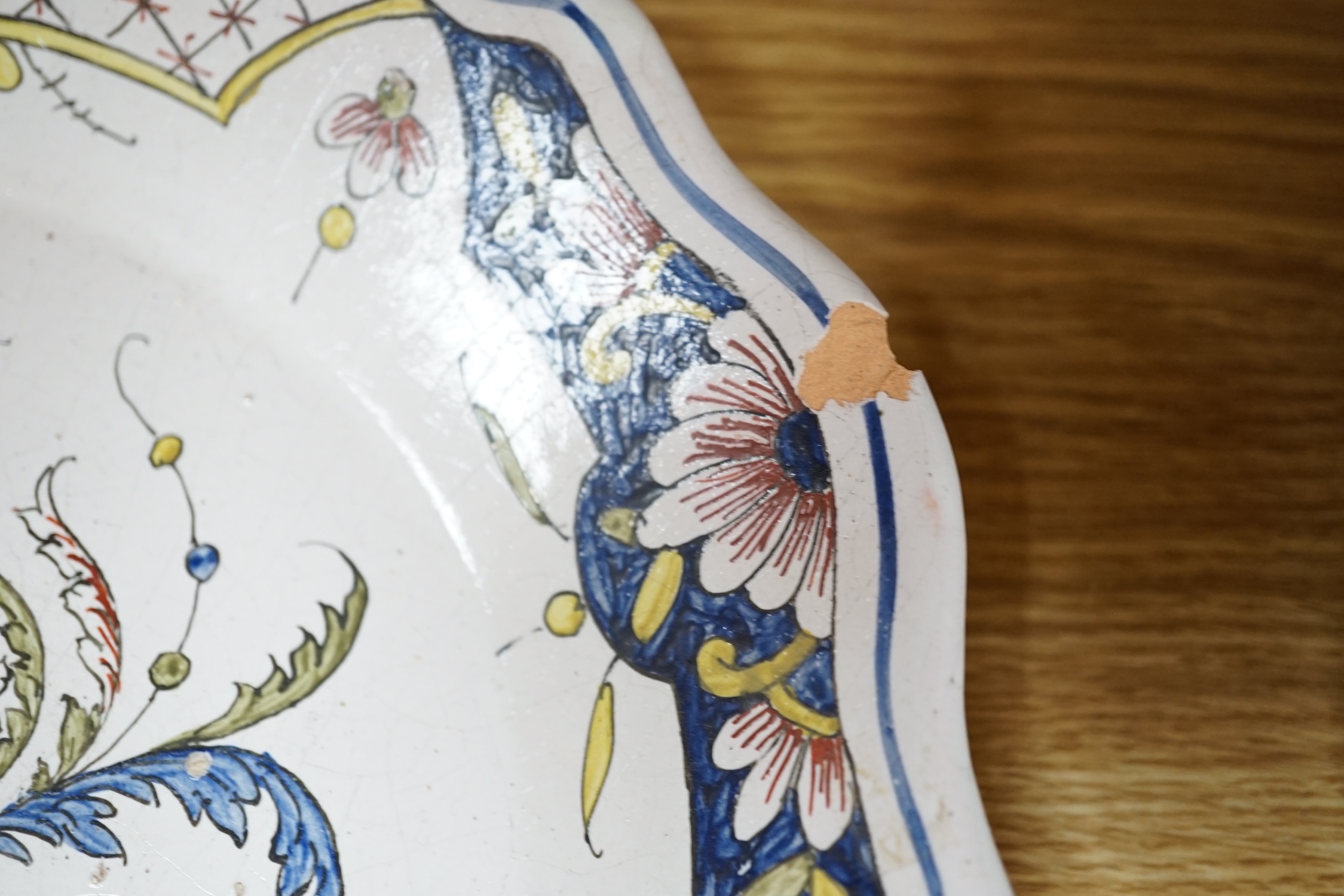 A collection of twenty 18th/19th century French faience polychrome and blue and white Revolution commemorative plates and three others, largest 27cm diameter (23). Condition - condition varies poor to good